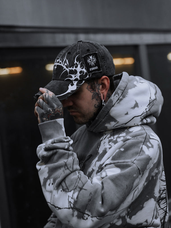Veiled Origins - Bleached Dad Cap (White) Lifestyle Image
